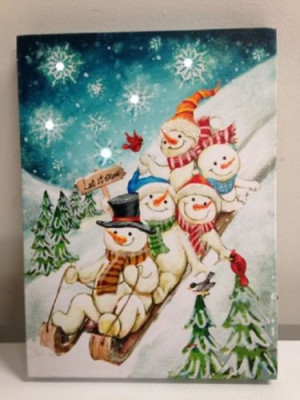 Sledding Snowman Family 